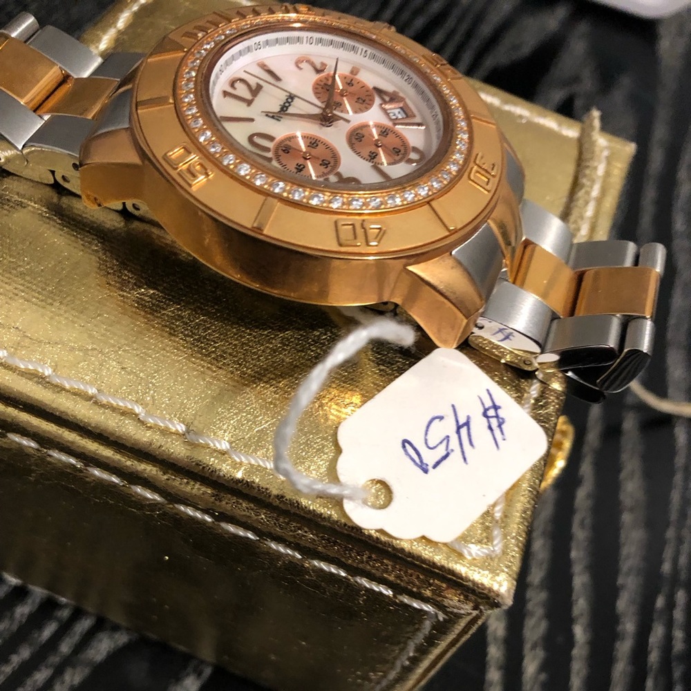 Facebook all stainless steel beautiful watch!! Rose gold and white! Chunky face!